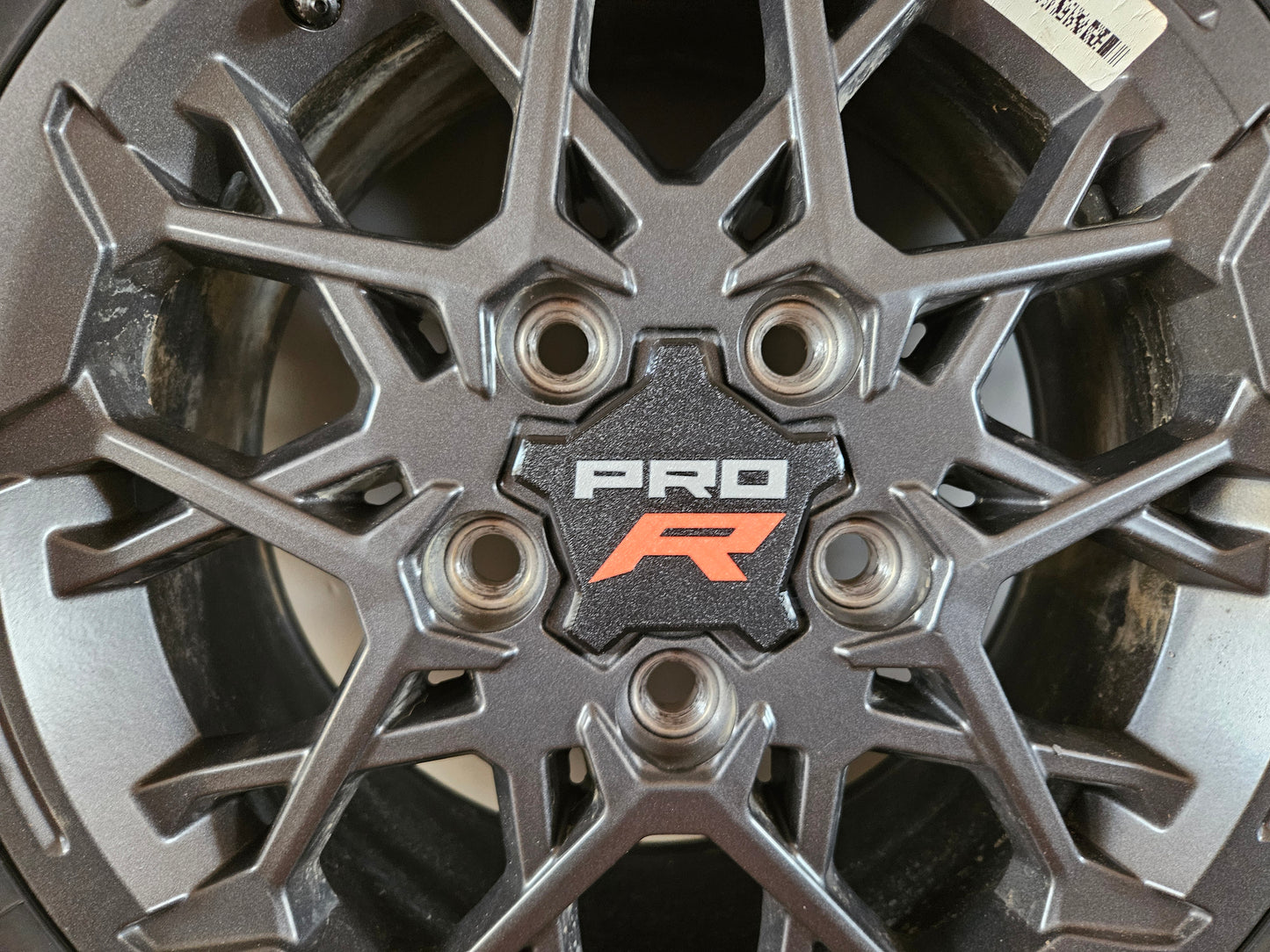 RZR Pro R Black Center Caps With Customizable X Logo (set of 4)