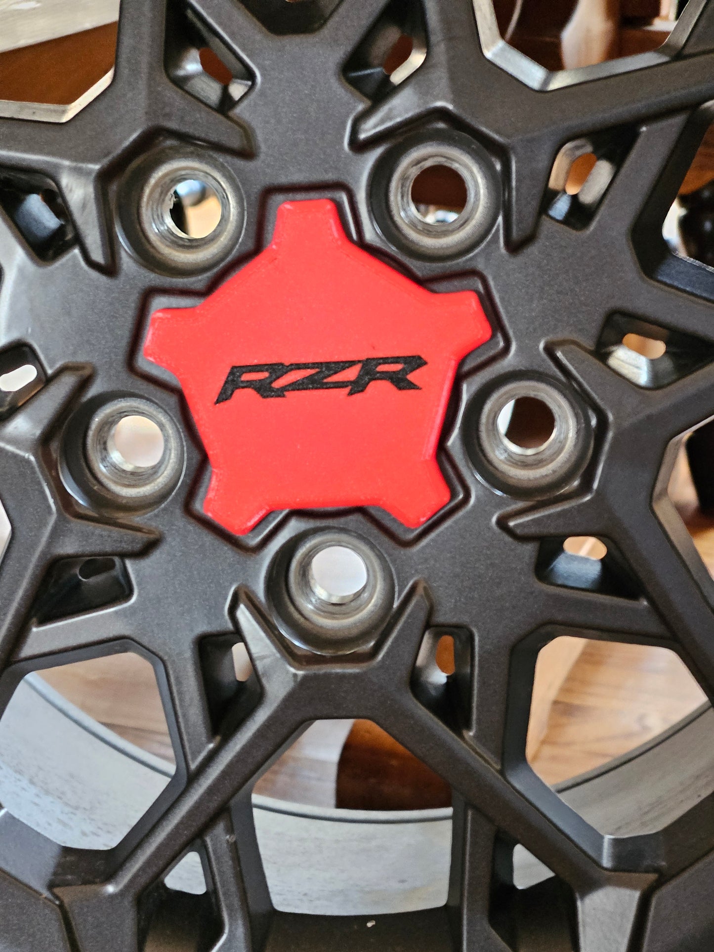 Red RZR Pro R Center Caps With Black Rzr Logo