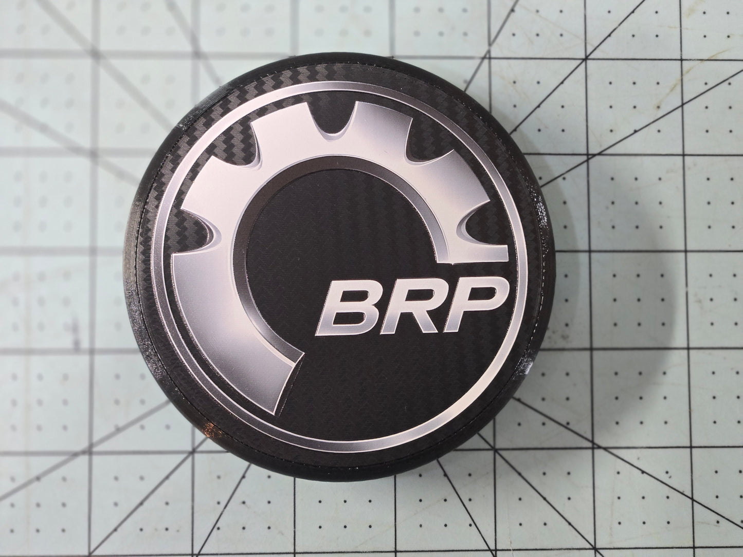 Can Am Maverick R OEM wheel black center caps with BRP logo